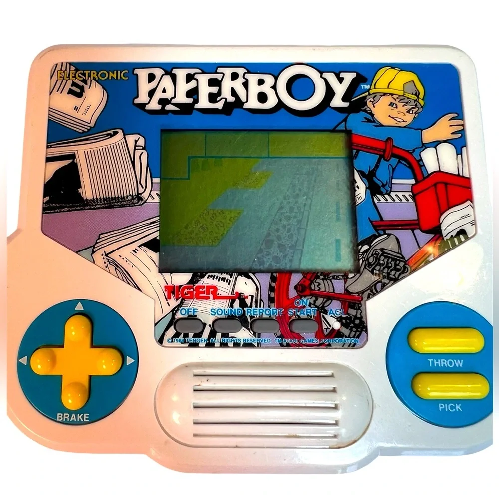 Vintage 1988 Handheld Electronic Paperboy Game by Tiger.  Working Condition.